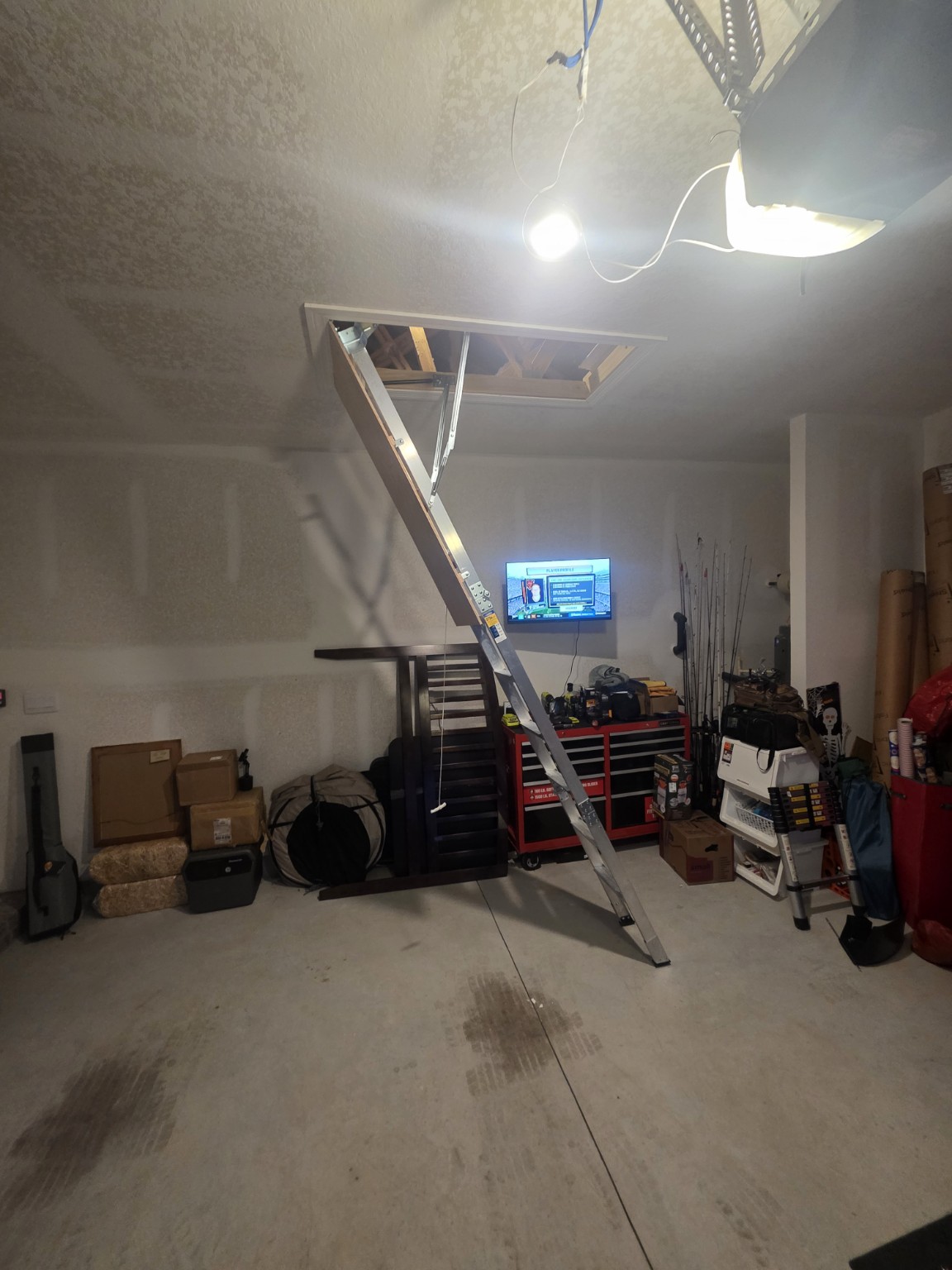 Garage attic ladder installation