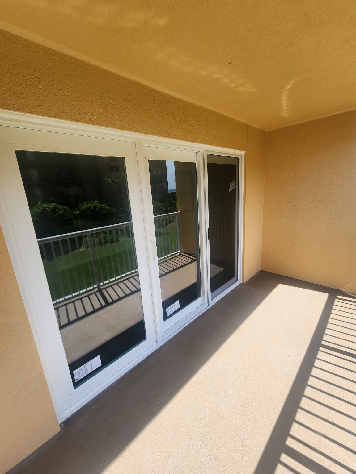 White sliding patio door installation